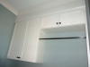 Cabinets and Drying rod in Laundry Room