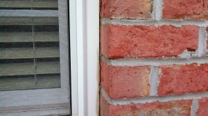 Windows need exterior caulk. Losing heat and costing energy dollars.