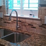 Custom Tile backsplash with glass strips