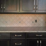 Tile backsplash dark cabinets